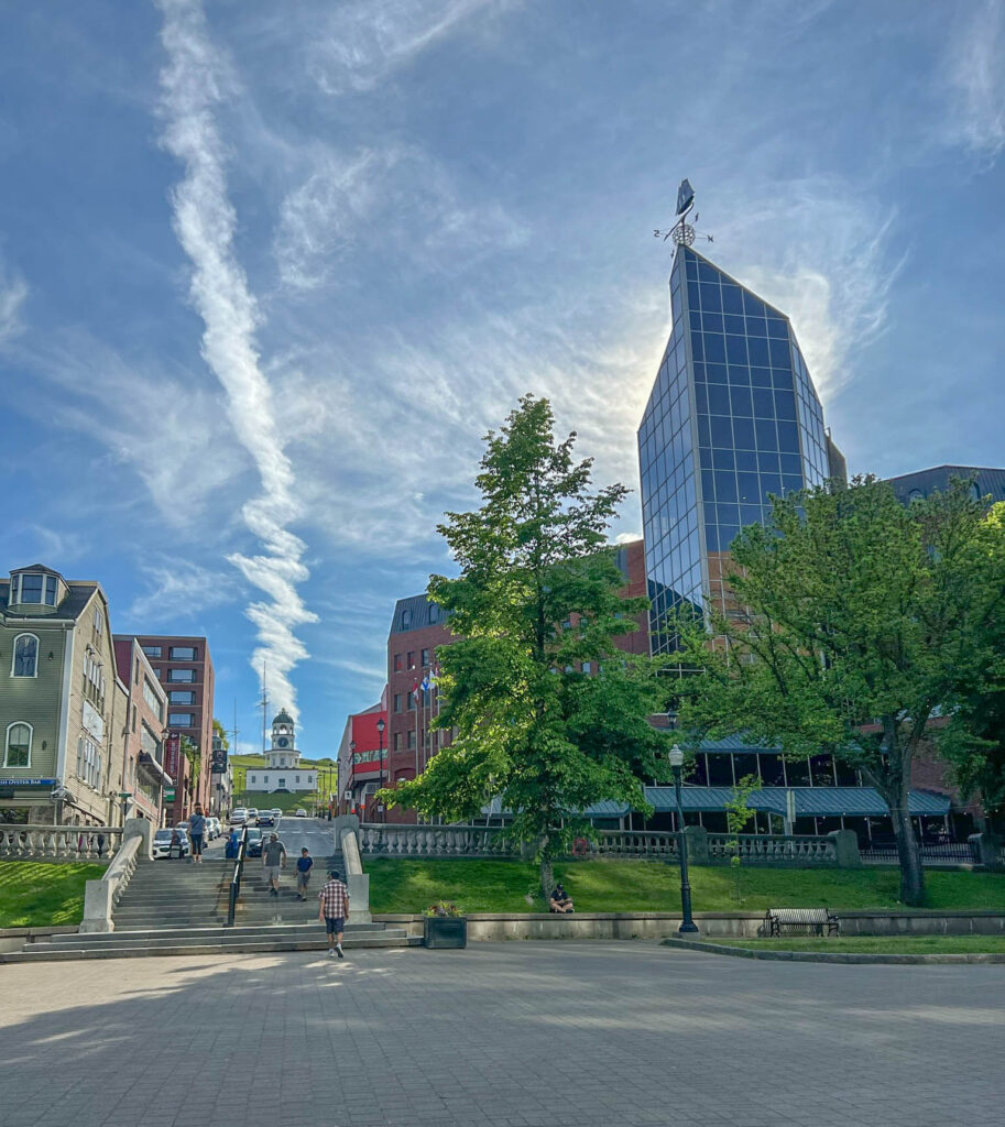 Walkway from The Grand Parade up to Citadel Hill, with curious clouds above "The Town Clock", operational since 1803