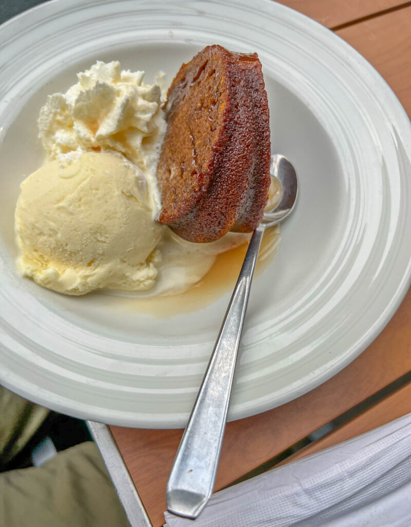 Warm gingerbread with vanilla ice cream, drizzled with caramel - very good!