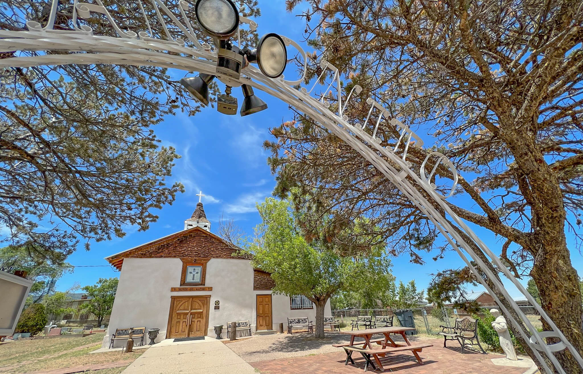 The gate in front of the San Antonito Catholic Mission Church and Cemetery