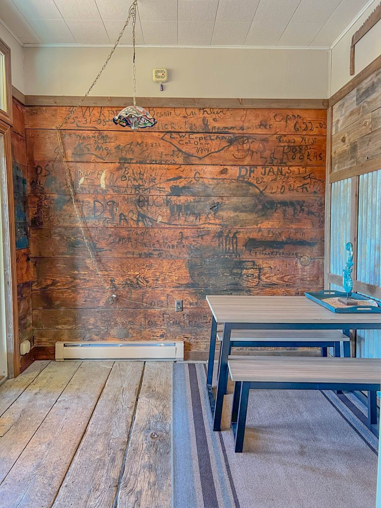 Kitchen wall with original writing from train passengers