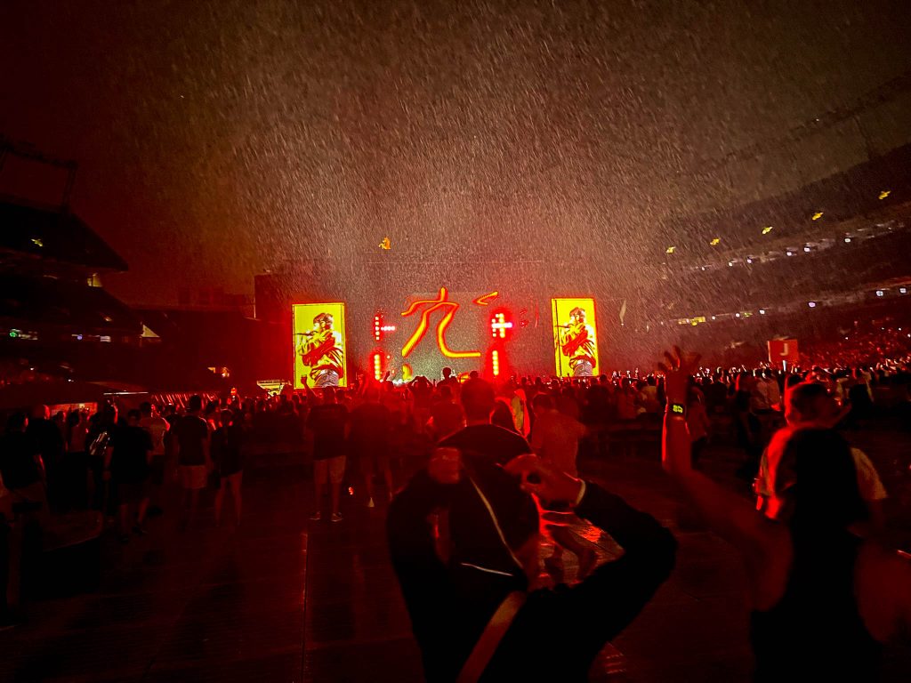 The Red Hot Chili Peppers show begins despite pouring rain