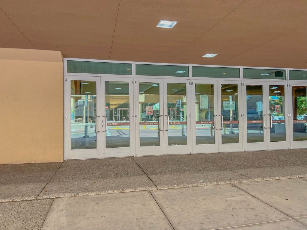 Use the far left doors of the 2nd street entrance of the west building of the convention center