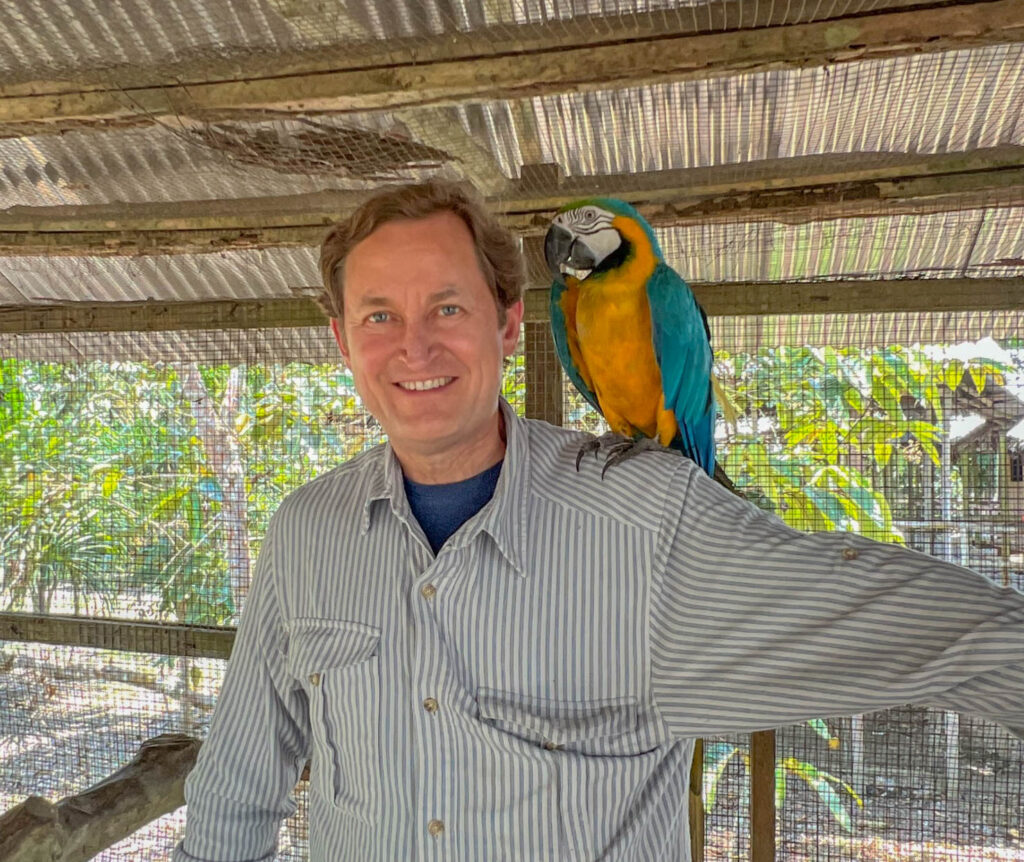 The macaw got a little closer to my head than I had hoped.  The macaw looked interested in tearing my ear off, but fortunately didn't follow through with it.