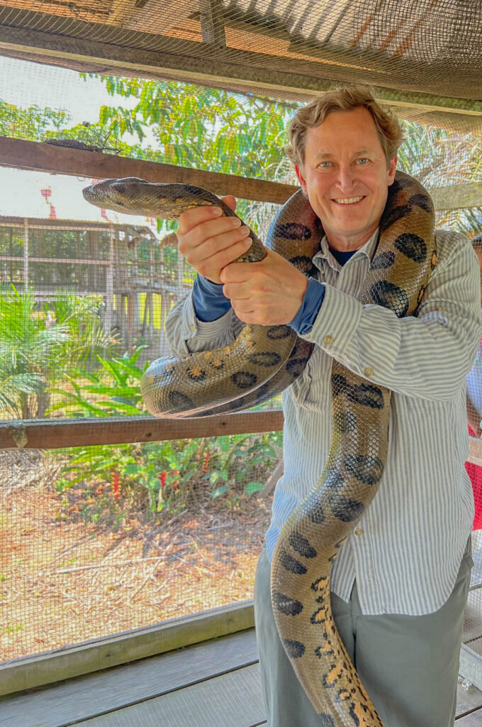 Not my dream come true, but I did it anyway as I figured it's a once in a lifetime opportunity to hold a green anaconda.  I'm not nearly as relaxed about this idea compared to my son but I force a smile anyway.