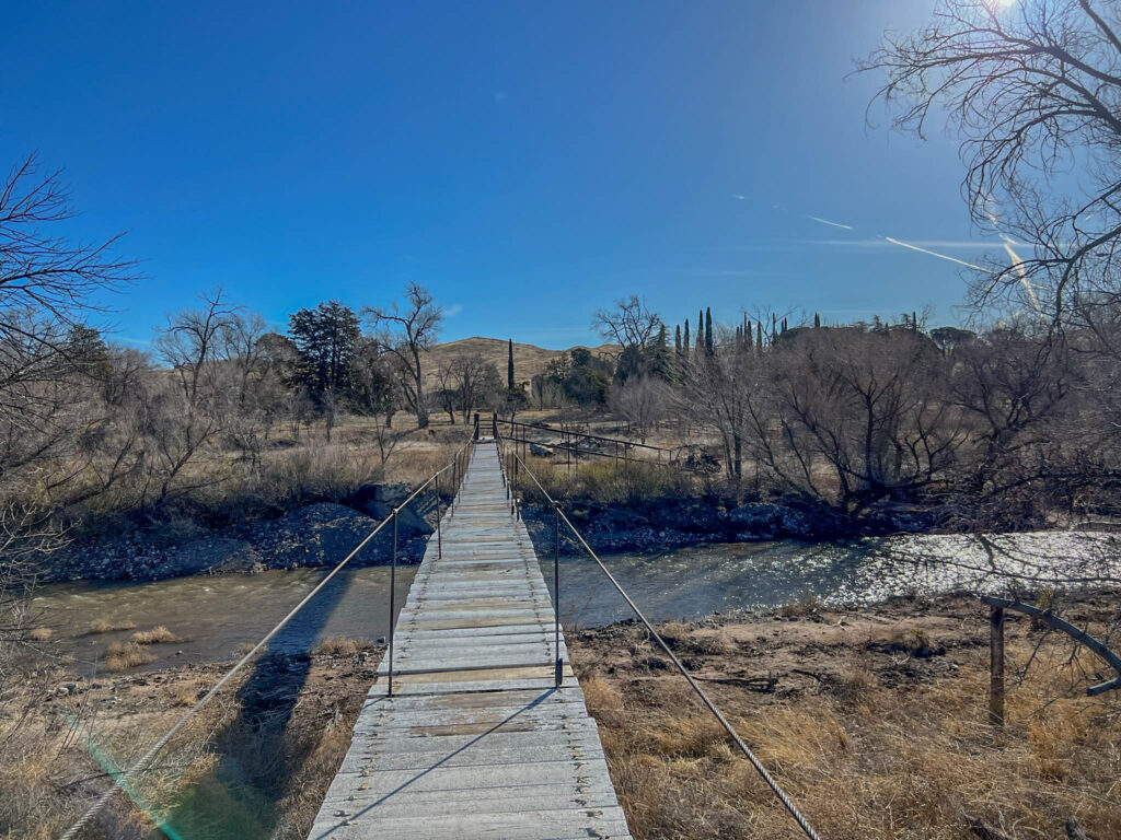 Option 2 is to park your car and walk across the bridge where a golf cart can pick you up and take you to your accommodations.