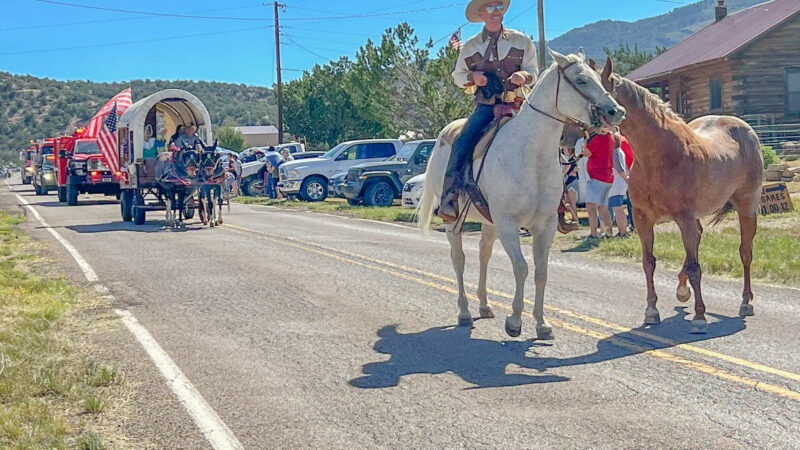 The Miner's Day parade makes its way through White Oaks, New Mexico.