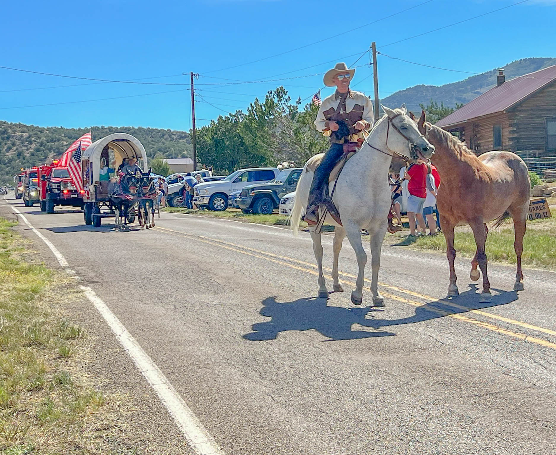 The Miner's Day parade makes its way through White Oaks, New Mexico.