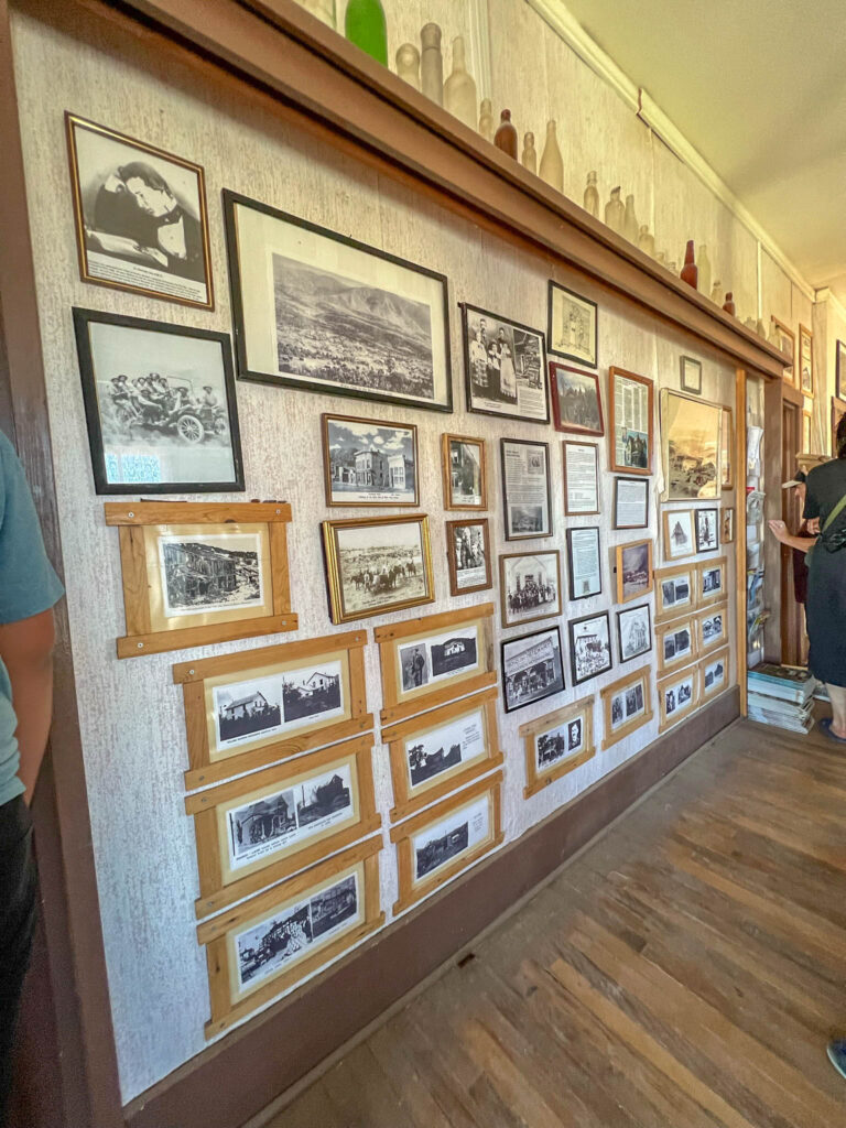 Old pictures line the walls of the school house