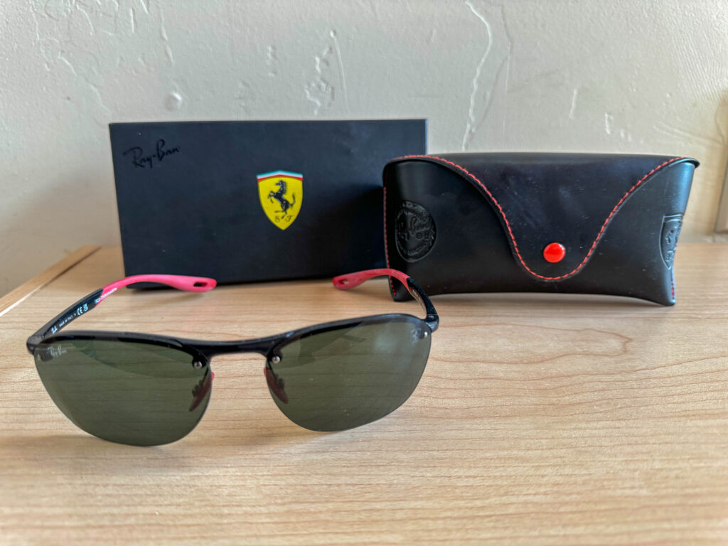 A new pair of special "Ferrari edition" Ray-Ban sunglasses ... way out of character for me, but fun.