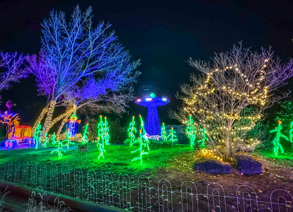 You'll find a new version of the UFO cow abduction at the River of Lights in 2024.