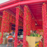 Ristras hanging from a store in Hatch, New Mexico