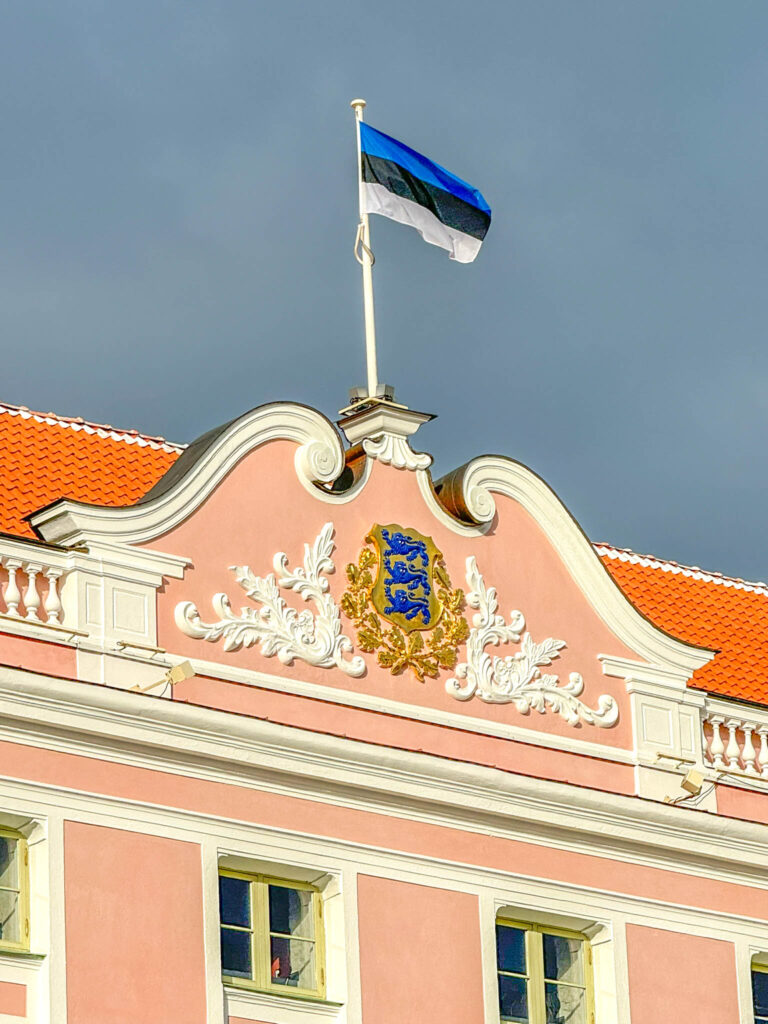 Welcome to Estonia! The Estonian flag flying above Toompea Castle, the seat of the Parliament of Estonia in Tallinn.