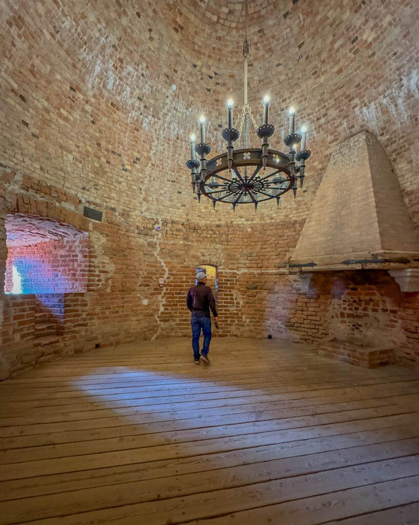 Turaida Castle spans multiple floors, each offering simple displays where visitors can pause and catch their breath before tackling the next set of stairs.