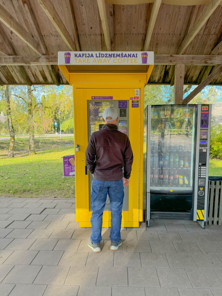 As we wrap up our visit to the Turaida Museum Reserve, my cousin gets ready for the next driving shift with a cup of vending machine coffee. Next stop, the town of Sigulda and Latvia's capital city, Riga.