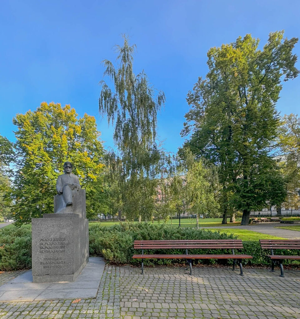 Rūdolfs Blaumanis (1863–1908) was a Latvian writer who had an uncanny ability to understand people and their inner struggles. His stories and plays often wrestled with big moral dilemmas, but he always managed to keep them grounded and relatable. Blaumanis’ works are still part of the curriculum in Latvian schools, shaping new generations and ensuring his legacy lives on. If you ever stroll through Bastejkalns Park, keep an eye out for his statue - a quiet tribute to a writer whose words continue to resonate more than a century later.