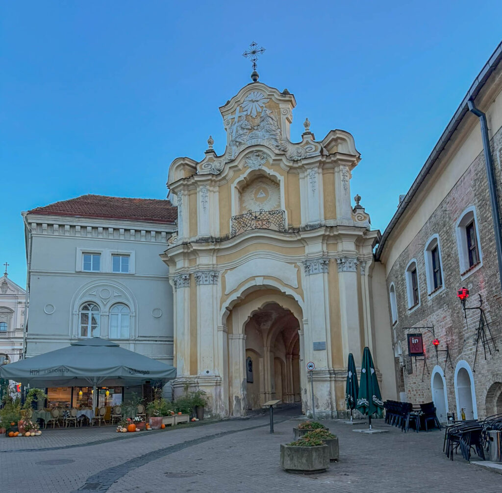 The Gate of St. Bernardine Monastery in Vilnius, Lithuania (also called Bazilijonų or St. Michael's Gate) is a Baroque beauty. Part of the Basilian Monastery Complex, it’s neighbors with St. Theresa's and the Holy Trinity Church. Tied to both Catholic and Orthodox traditions, it stands as a reminder of the city's mix of faith, art, and history. Sitting near Vilnius Old Town, it’s a striking contrast to the simple medieval streets nearby.