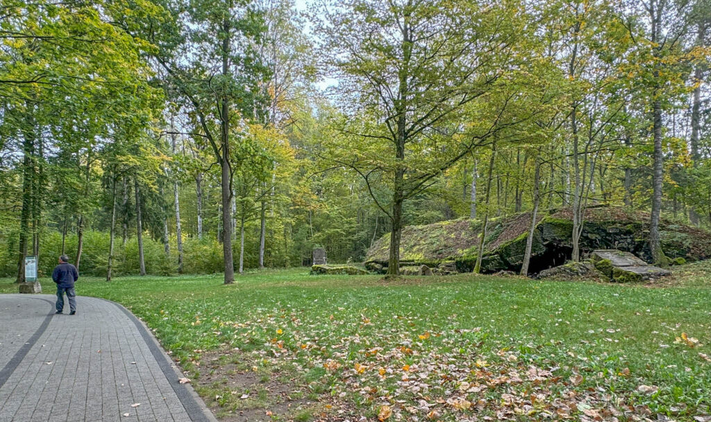 As you stroll along the trail winding through the Wolf’s Lair, you’ll come across many destroyed bunkers scattered around area. There are interpretive signs at each bunker, indicating what used to be there.