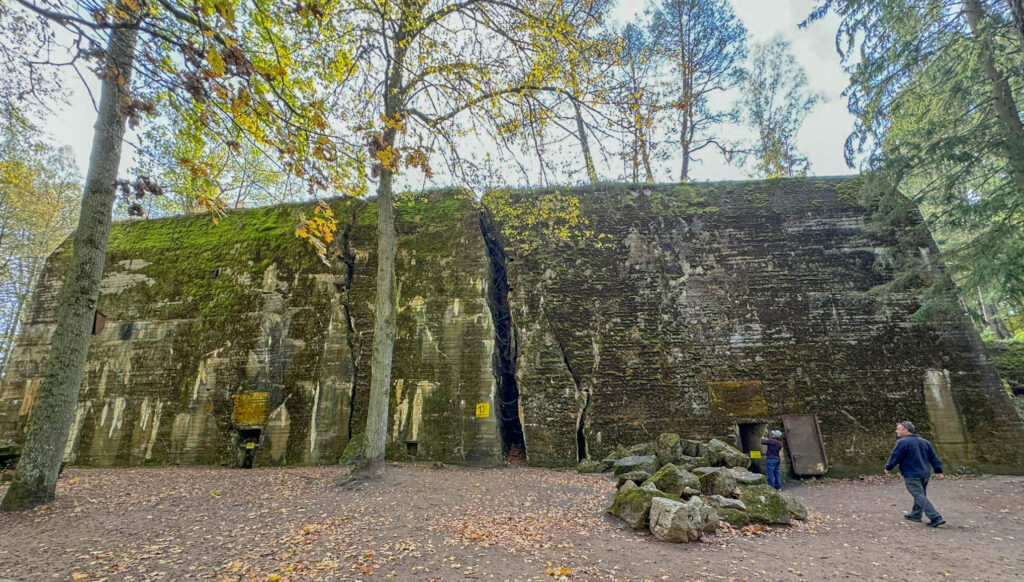 Hitler's bunker at Wolf's Lair was built like a fortress, with concrete walls so thick—about 8 meters—that they could shrug off bombs and shells like they were just minor inconveniences. Tucked away in Security Zone 1, this bunker wasn’t just a hideout; it included Hitler’s private rooms, a conference area, and spaces for communications, making it a nerve center of operations. When the German forces started retreating in 1945, they partially demolished the structure to keep it out of Soviet hands, leaving behind a mix of ruins and history.