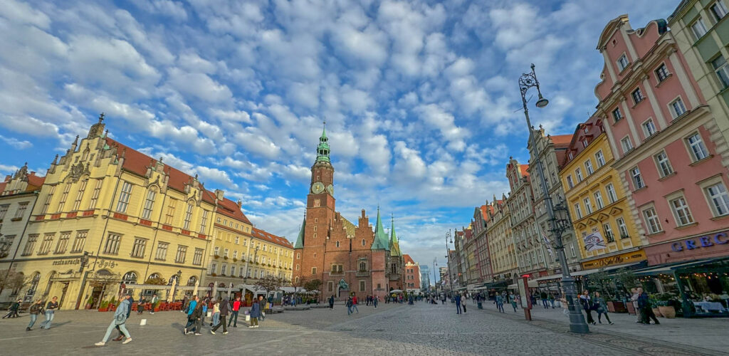 In the center of this photo you'll see St. Elizabeth’s Church (Bazylika św. Elżbiety Węgierskiej), one of Wrocław’s most striking Gothic landmarks. Located just a stone’s throw from Market Square (Rynek), this historic church is easy to spot thanks to its towering brick structure and the green spire that crowns it. Fun fact: that tower once doubled as a fire lookout. Dating back to the 14th century, this church has been through a lot - wars, repairs, and all the ups and downs that come with centuries of history. These days, it offers visitors a chance to climb its tower for terrific views of Wrocław.