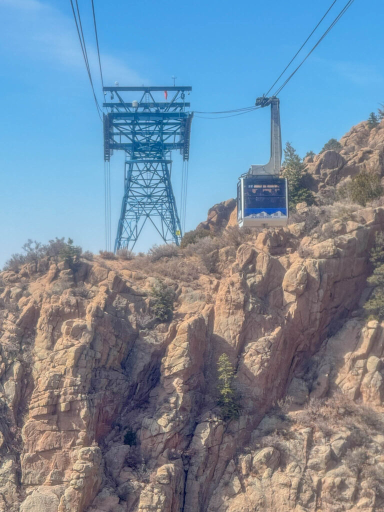 Tower 2 (photo was taken during my descent) stands 80 feet tall on a rocky outcropping at 8,750 feet. Since it's inaccessible by road, it required 2,000 helicopter trips to put it together.