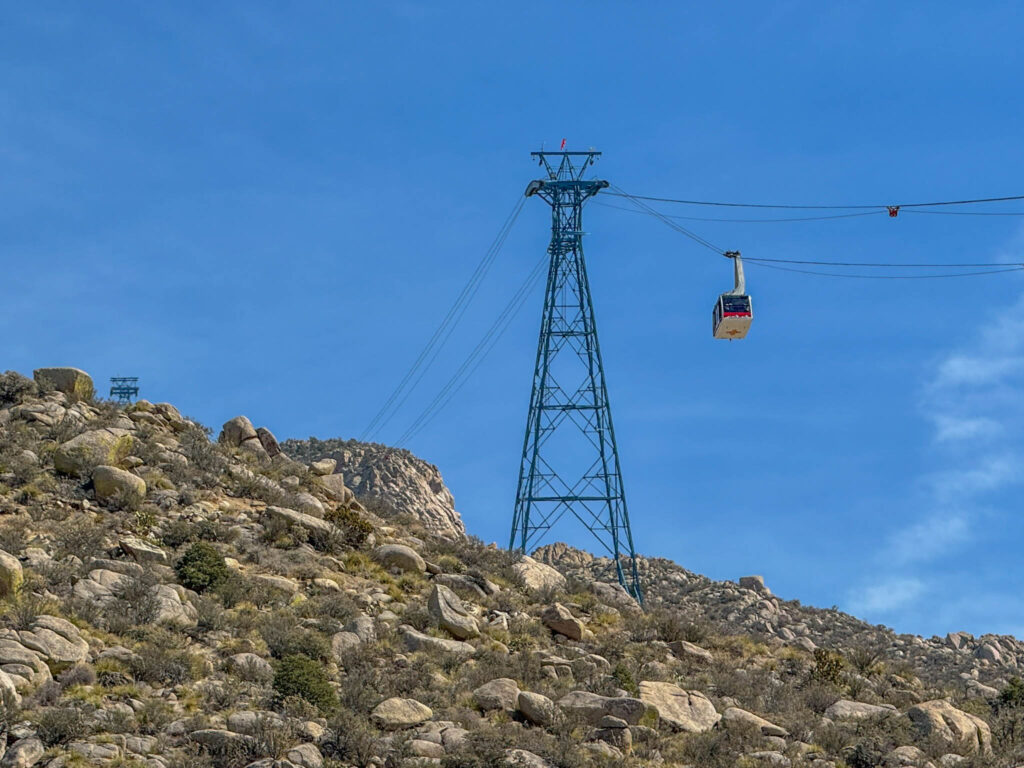 A look at the tram as it approaches Tower 1, which stands 232 feet tall. Perched at an elevation of 7,010 feet, it’s tilted at an 18-degree angle, a clever design choice to spread the cable load evenly into the mountainside.