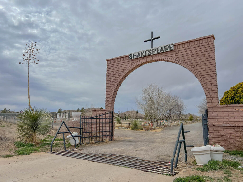 Entrance to the Shakespeare Cemetery, where weathered headstones and desert brush mark the final resting place of pioneers, miners, and a few outlaws who didn’t make it past the Grant House.
