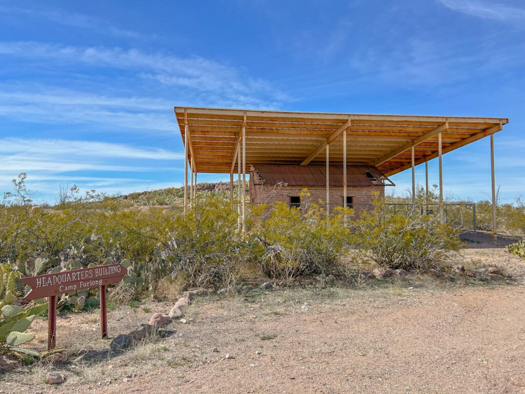 The old headquarters building at Camp Furlong, located in Pancho Villa State Park in Columbus, New Mexico. Used by the U.S. Army during the 1916 Punitive Expedition after Pancho Villa’s raid, the structure now sits beneath a protective shade canopy—less about style, more about saving the historical structure from the New Mexico sun.