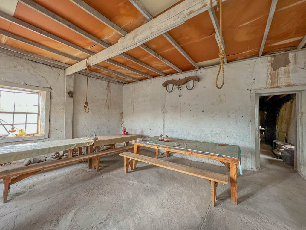 Inside the Grant House at Shakespeare Ghost Town, where outlaws “Russian Bill” and Sandy King were hanged in 1881. The nooses remain in place—a stark reminder that frontier justice didn’t always require a courthouse, just a beam and a decision.