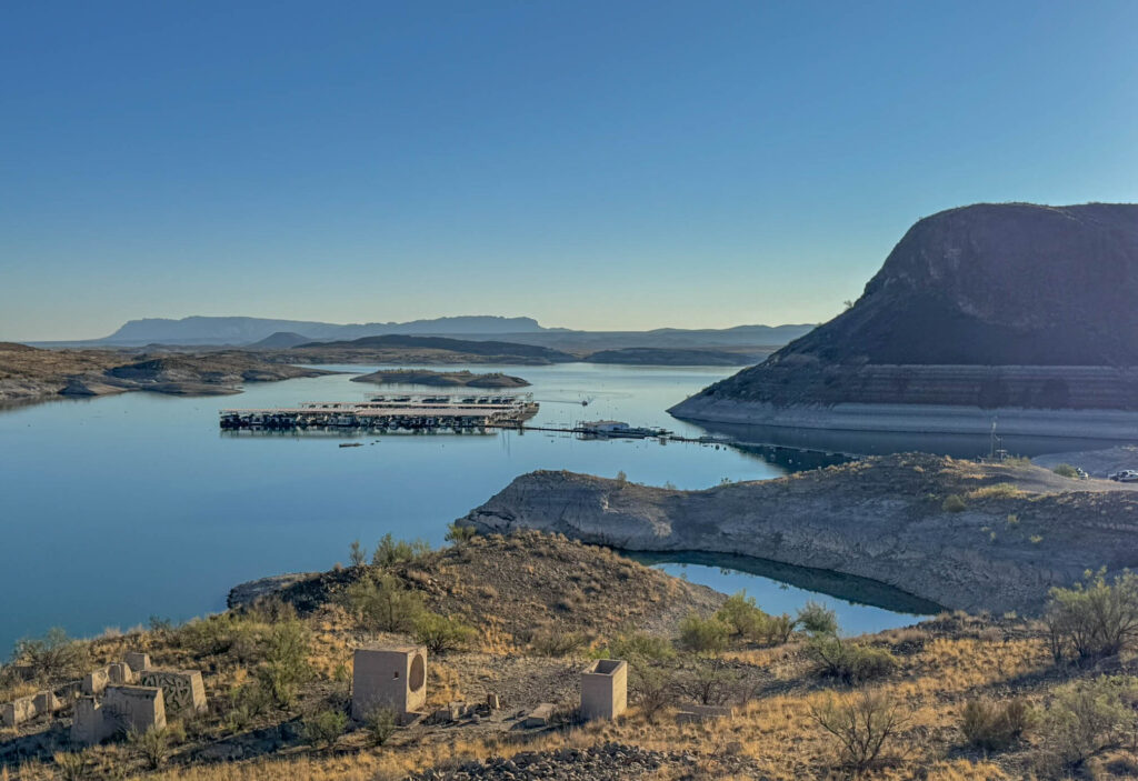 Dam Site Marina, framed by the volcanic plug that gave Elephant Butte its name. This quieter marina sits near the historic dam and the soon-to-be-renovated canyon casitas.