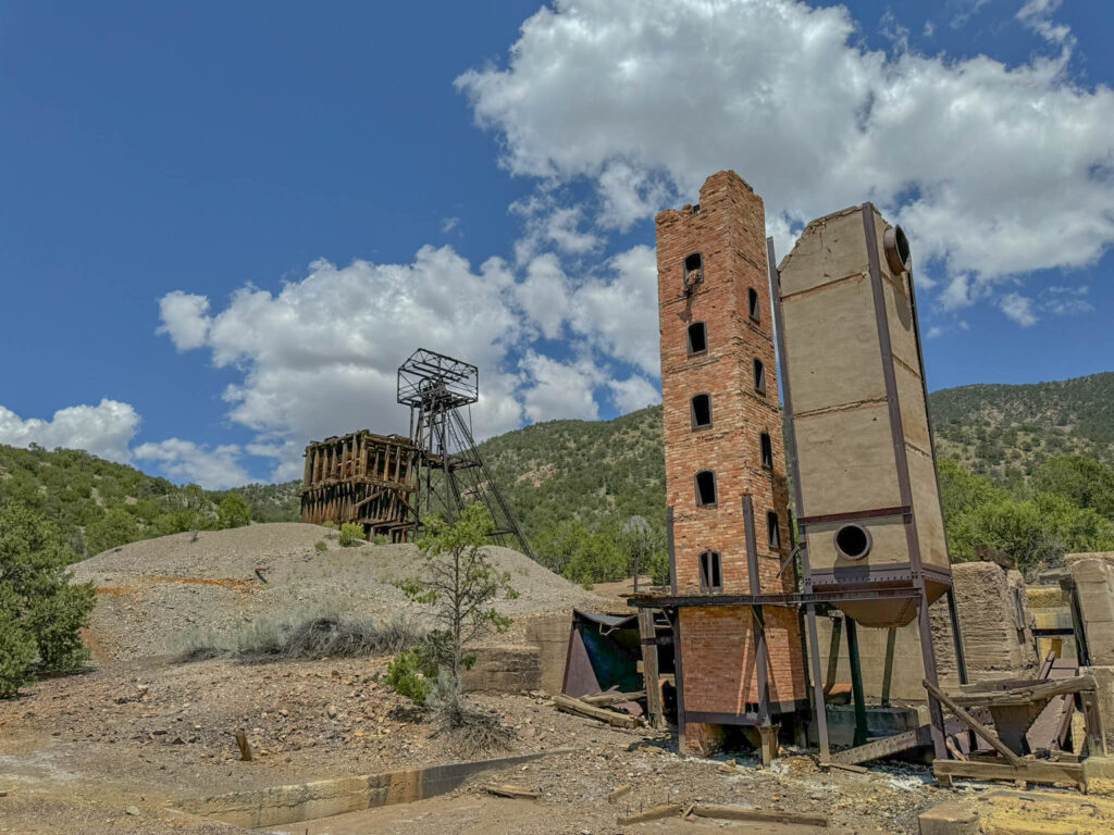 Ruins of the Kelly Mine near Magdalena—once the center of a booming mining town fueled by zinc, lead, and silver. At its peak in the early 1900s, Kelly had stores, saloons, churches, and a population of 3,000. Today, little remains beyond foundations and the towering 121-foot steel headframe—designed by a Carnegie Steel engineer and still standing like it’s waiting for a shift change. The road gets rough near the end, so plan to hike the last stretch as most vehicles won't be up for the challenge.