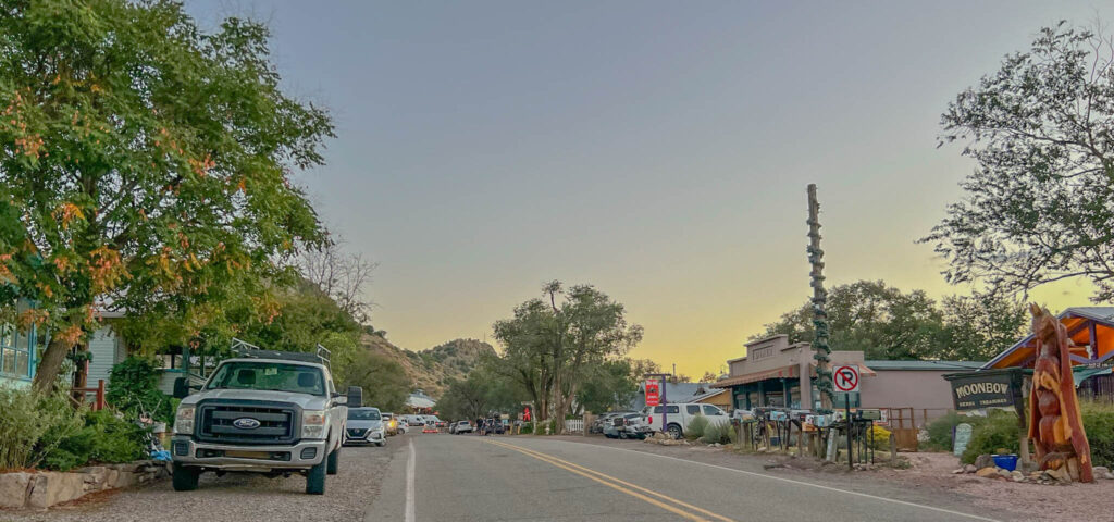 Main Street, Madrid, New Mexico — once a bustling coal town, now home to galleries, shops, and a strong creative streak. This quiet stretch draws visitors with its mix of history, art, and offbeat character.