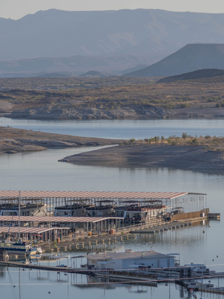 Dam Site Marina, located in the canyon with a front-row view of the reservoirās quieter coves and early morning calm.