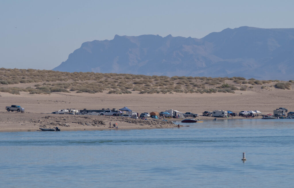 Many people camp right along the water after entering through Elephant Butte State Park's main entranceājust make sure your vehicle can handle the sand. (Spoiler: a lot canāt.)