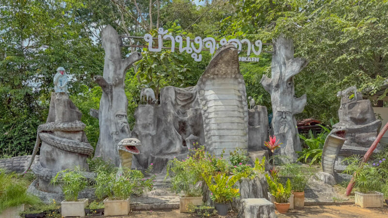 Giant cobra sculptures welcome visitors to King Cobra Village.