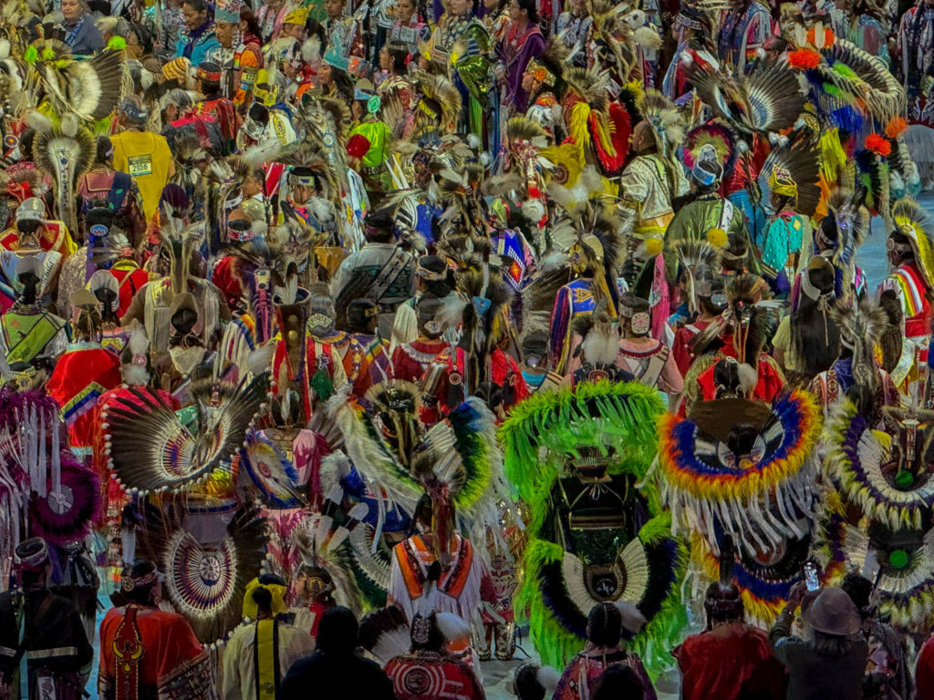 Feathers, beadwork, color, and movement filled nearly every corner of the arena floor.