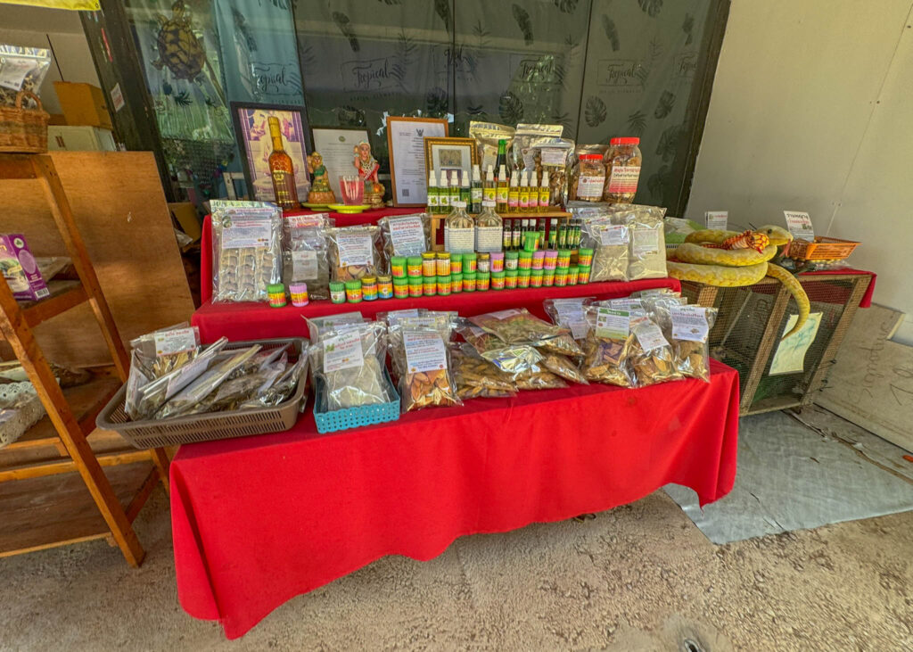 Traditional herbal remedies and products for sale at the village, but no T-shirts to be found.