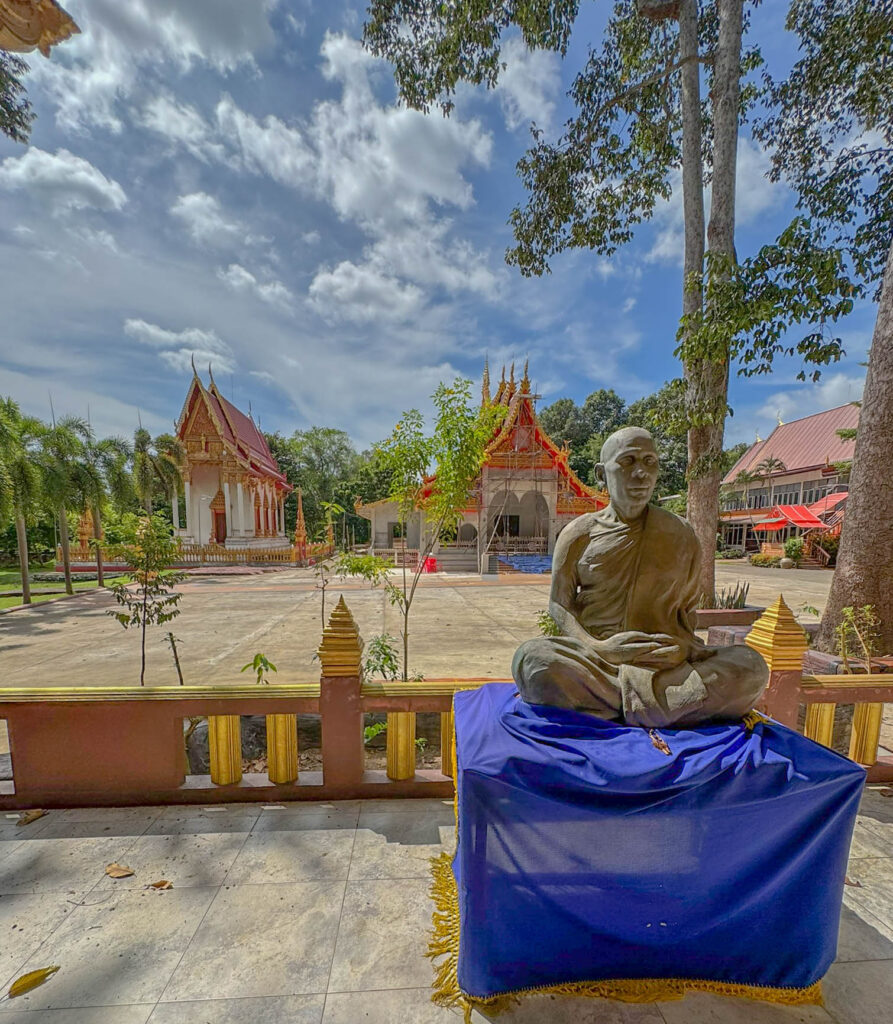 We assumed we were heading straight toward those ornate temple buildings… but instead got steered left, away from all of it.