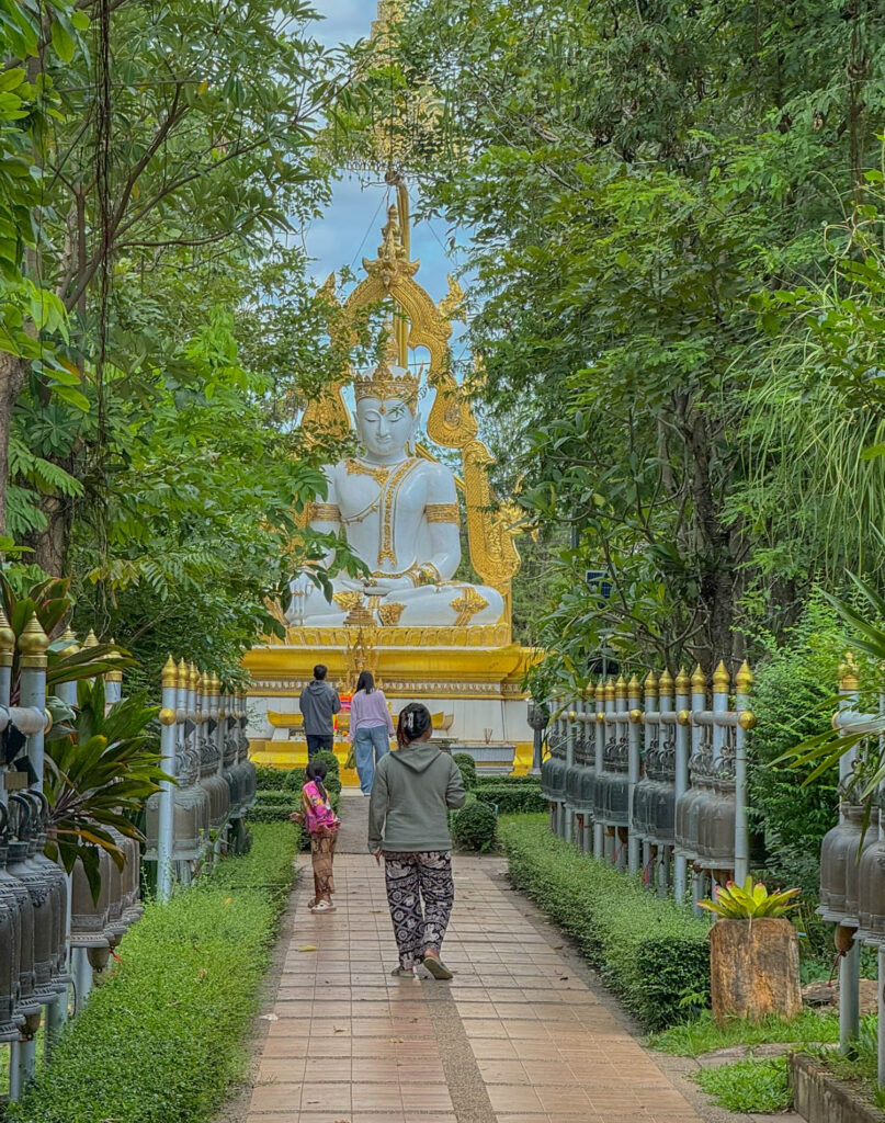 Local Thai visitors making their way up to pay their respects.