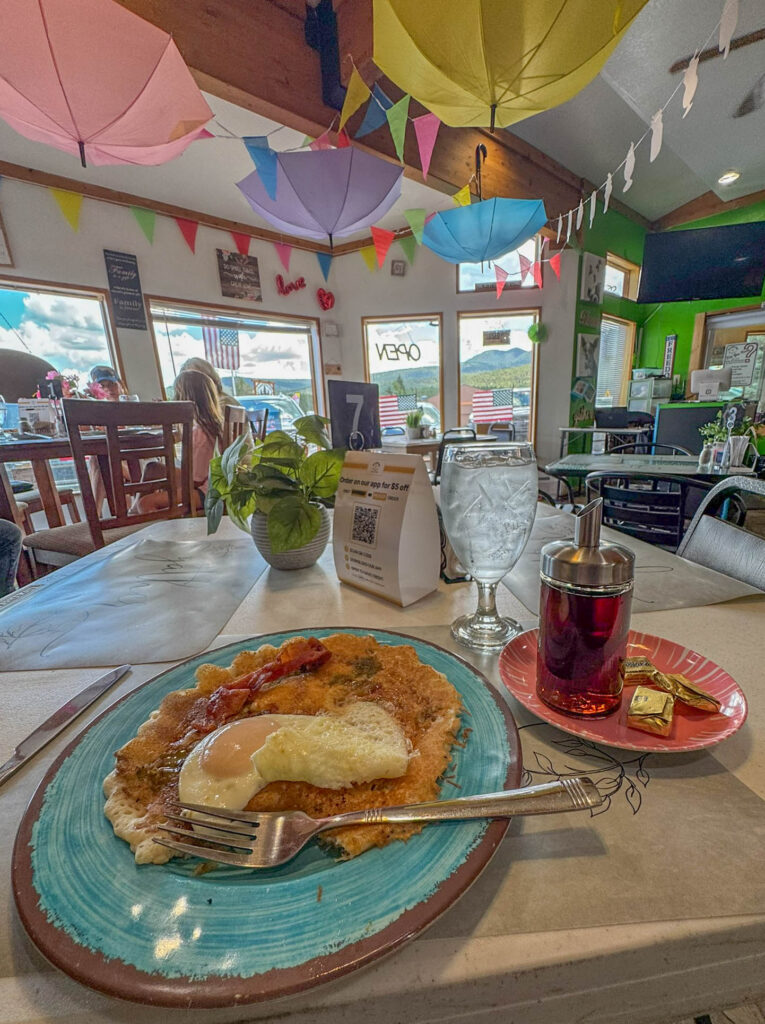 My first green chile pancake, complete with bacon and an egg, at Morning Star Restaurant in Angel Fire.