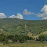 Angel Fire Resort in summer, where the ski slopes transform into hiking trails, mountain bike runs, and scenic chairlift rides.