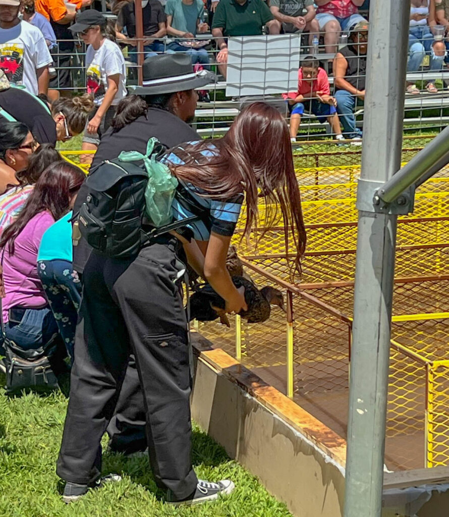 A racer gets her duck into position at McKinley Duck Downs.