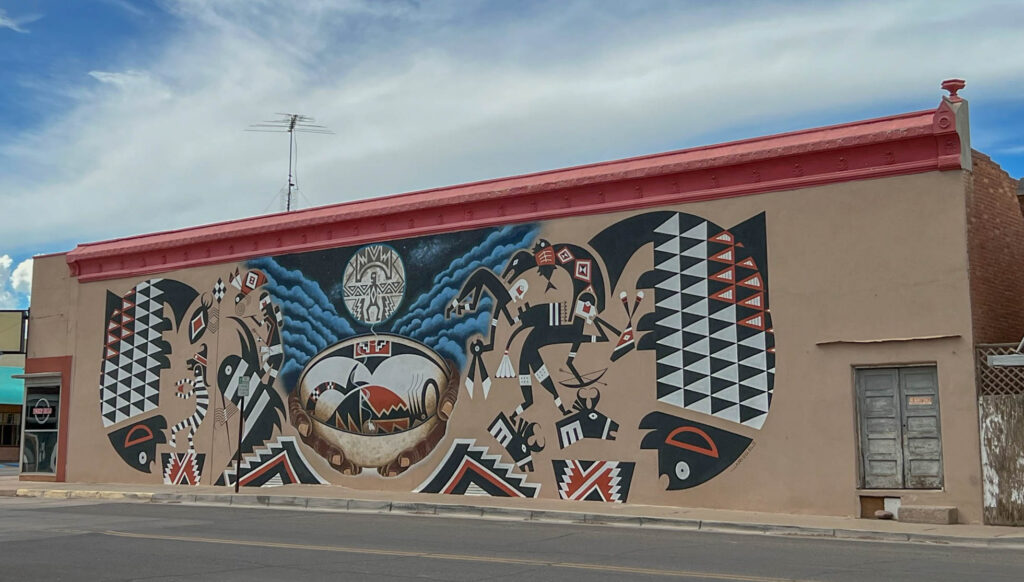 Deming artist Jesse Kriegel’s Mimbres-inspired mural pays tribute to the distinctive designs found on Mimbres pottery. Kriegel also designed the official logo for the 2026 Great American Duck Race.