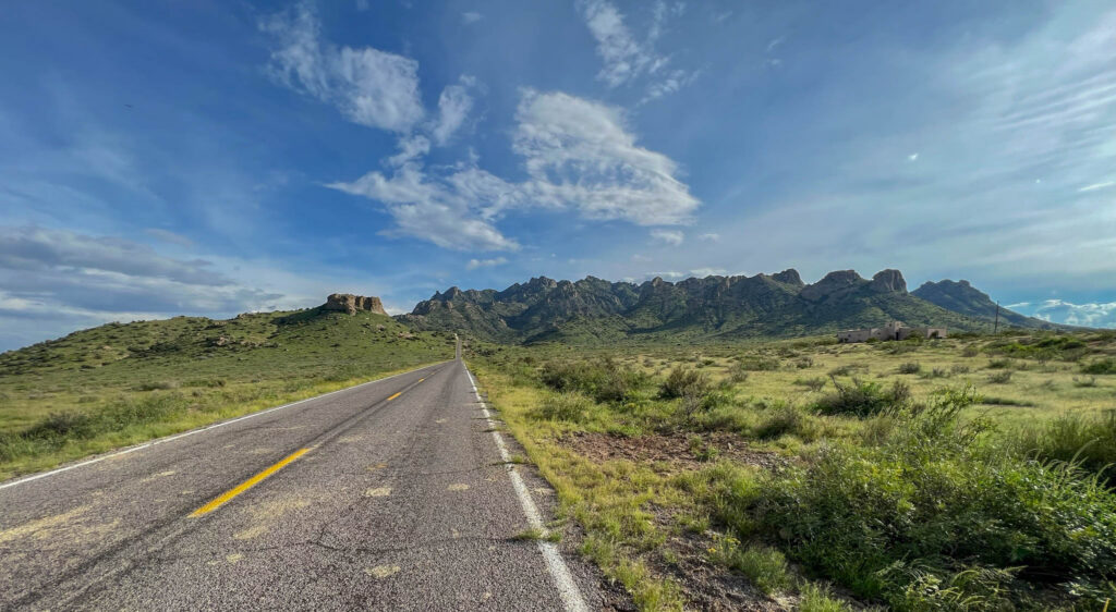 The road to Rockhound State Park heads straight toward the jagged mountains southeast of Deming.